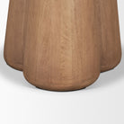 Sculptural solid mango wood pedestal base of the Caspia dining table