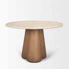 Three-quarter view of the Caspia marble dining table and sculptural wood base