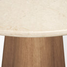 Rounded Botticino marble edge and mango wood pedestal detail on the Caspia dining table