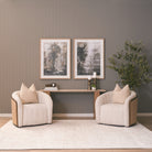 Wide room view featuring the Cavelle Travertine & Oak Console Table positioned behind two upholstered lounge chairs.