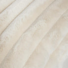 Detailed close-up of the ribbed faux fur square cushion from the Cloudline trio highlighting its soft, channeled texture.