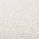Close-up of a textured pebbleloop boucle fabric surface