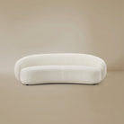 White, modern Contour Bliss Boucle sofa on a beige background
