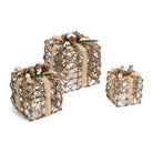 Set of three natural twig decorative gift boxes with pinecones, greenery, berries, and burlap bows