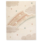 Full view of Dreamy Arc Kids Rug with a soft pastel rainbow, clouds and stars on an ivory background.
