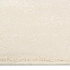 Close-up of the Dreamy Arc Kids Rug showing its soft-touch ivory pile texture.