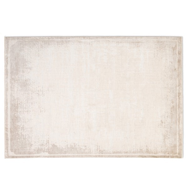 Full overhead view of the rectangular Elara distressed soft-touch rug featuring a subtle vintage pattern in beige and cream.