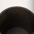 Top-down view inside the empty drum of the dark wood Eleanor fluted side table, showcasing its deep storage capacity.