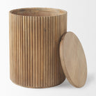 The Eleanor fluted wood side table with its round lid removed, revealing the hidden interior storage space.