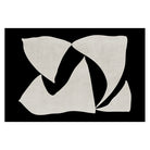 Elegance in Motion Rug with abstract cream shapes on a bold black background