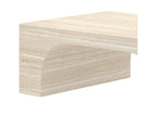 Close-up of the Elio travertine coffee table showing texture and pattern 