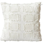 Textured white pillow on a gray background