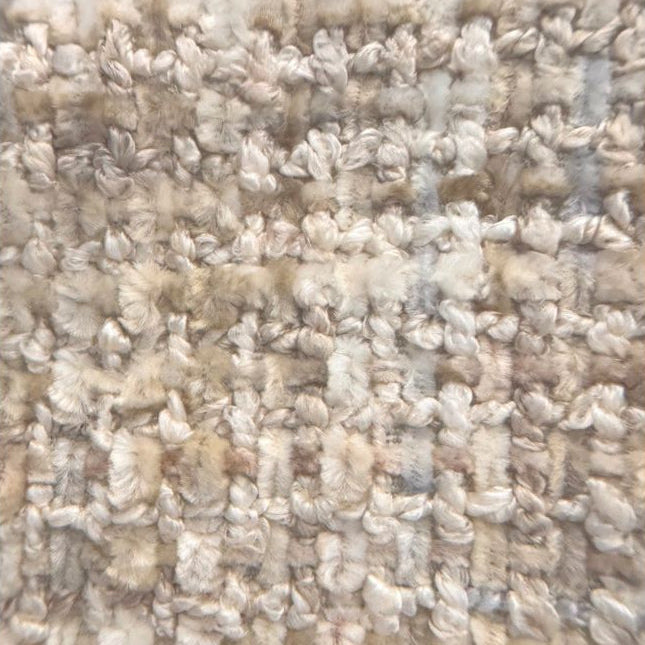 Close-up of textured beige fabric for the Estelle Accent Chair