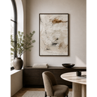 Modern interior with abstract art, desk, and chair.