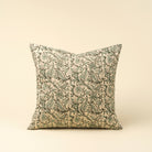 Decorative pillow with floral pattern on a beige background