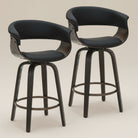 Pair of black Halo Swivel Counter Stools with dark wood frames