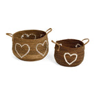 Set of two natural banana leaf baskets with cream stitched hearts