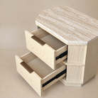 [Hexley White Oak & Travertine Nightstand] Angled overhead view with both drawers open, showing the storage interiors and natural yellow travertine top.