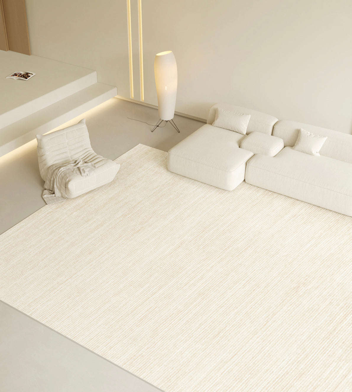 Isabella Rug styled in a warm minimalist living room with a white modular sofa