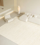 Isabella Rug styled in a warm minimalist living room with a white modular sofa