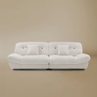 Front view of the Italian Style Cloud Sofa in a light beige studio background
