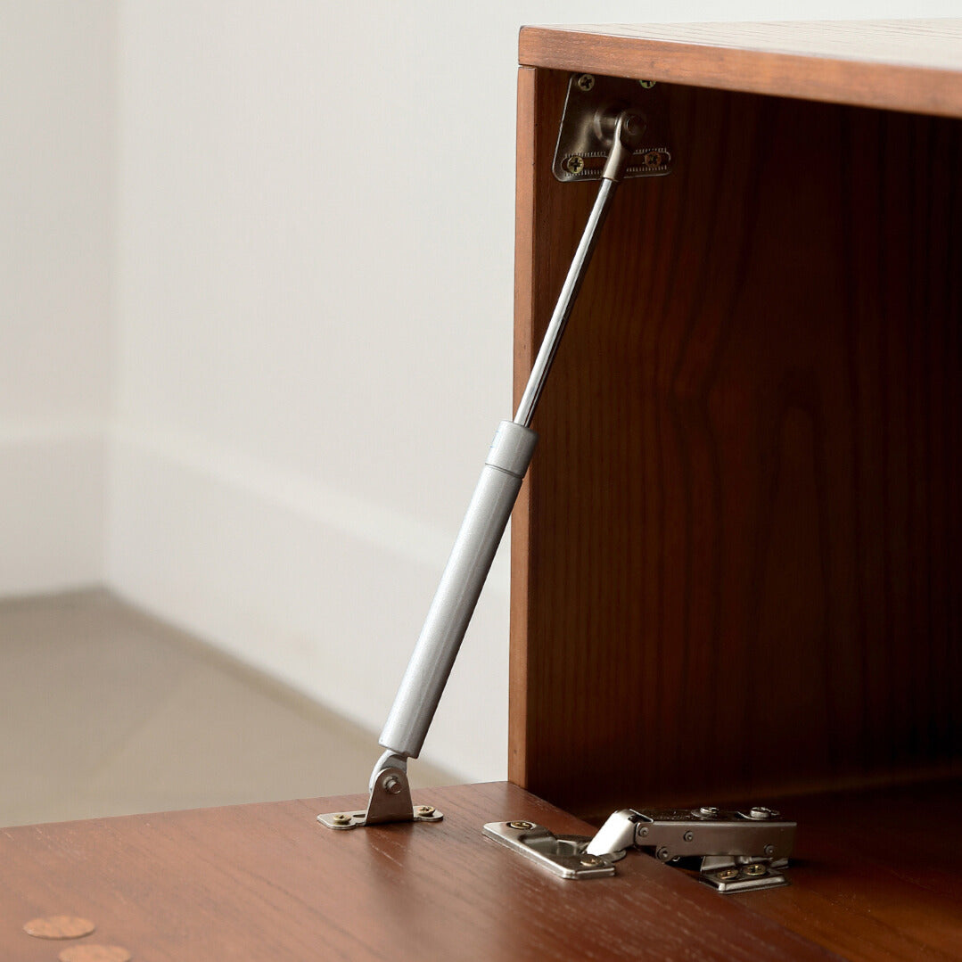 Close-up of the Jasper Modular Sideboard interior hinge and support hardware
