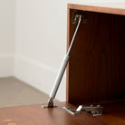Close-up of the Jasper Modular Sideboard interior hinge and support hardware