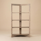 Full front view of the Kade wooden geometric shelving unit featuring five open tiers in a natural light wood finish.