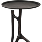 Black side table with a round top and unique base design on a white background