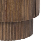 Wooden cylindrical base with a fluted texture on a white background