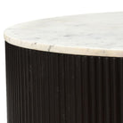 Detail close-up of the Kaia round coffee table showcasing the marble thickness