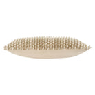 Decorative pillow with beaded texture on a white background