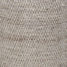 Close-up of a textured beige fabric surface