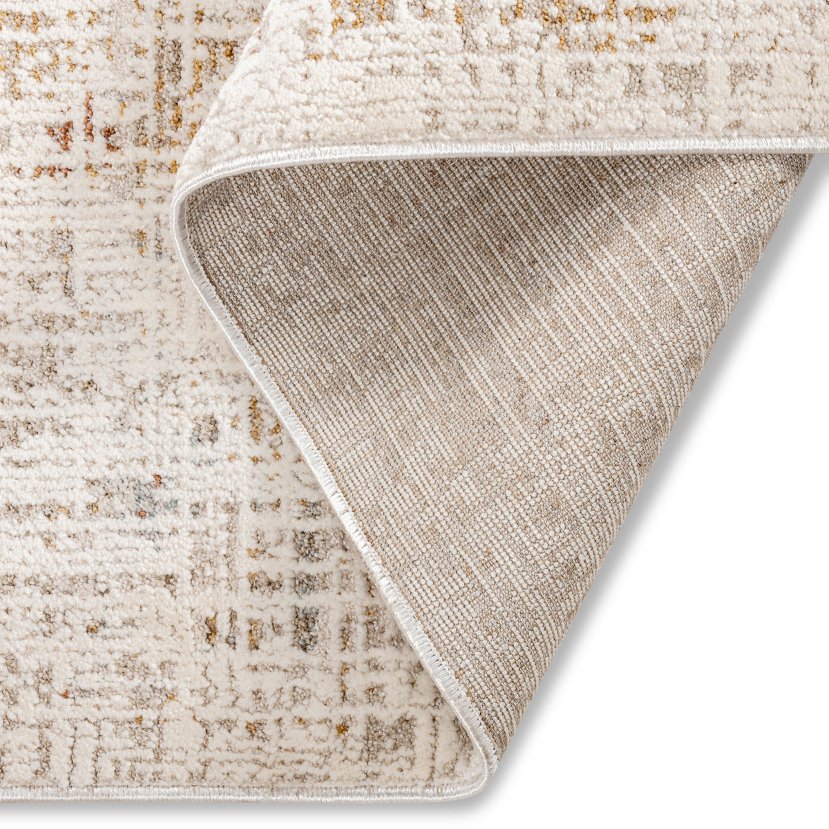 Corner view of the Lennox distressed abstract rug highlighting its tidy bound edges and modern artistic pattern