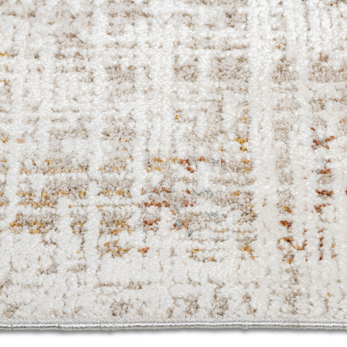 Close-up of the distressed abstract grid pattern featuring cream, grey, and rust tones on the Lennox area rug