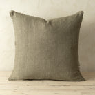 Full front view of the Lina linen pillow featuring a natural raw-edge fringe detail.