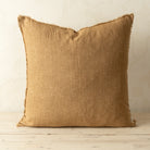 Full front view of the Lina linen pillow featuring a natural raw-edge fringe detail.