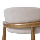 Linen fabric and ash wood details of the Linen Ash Wood Dining Side Chairs