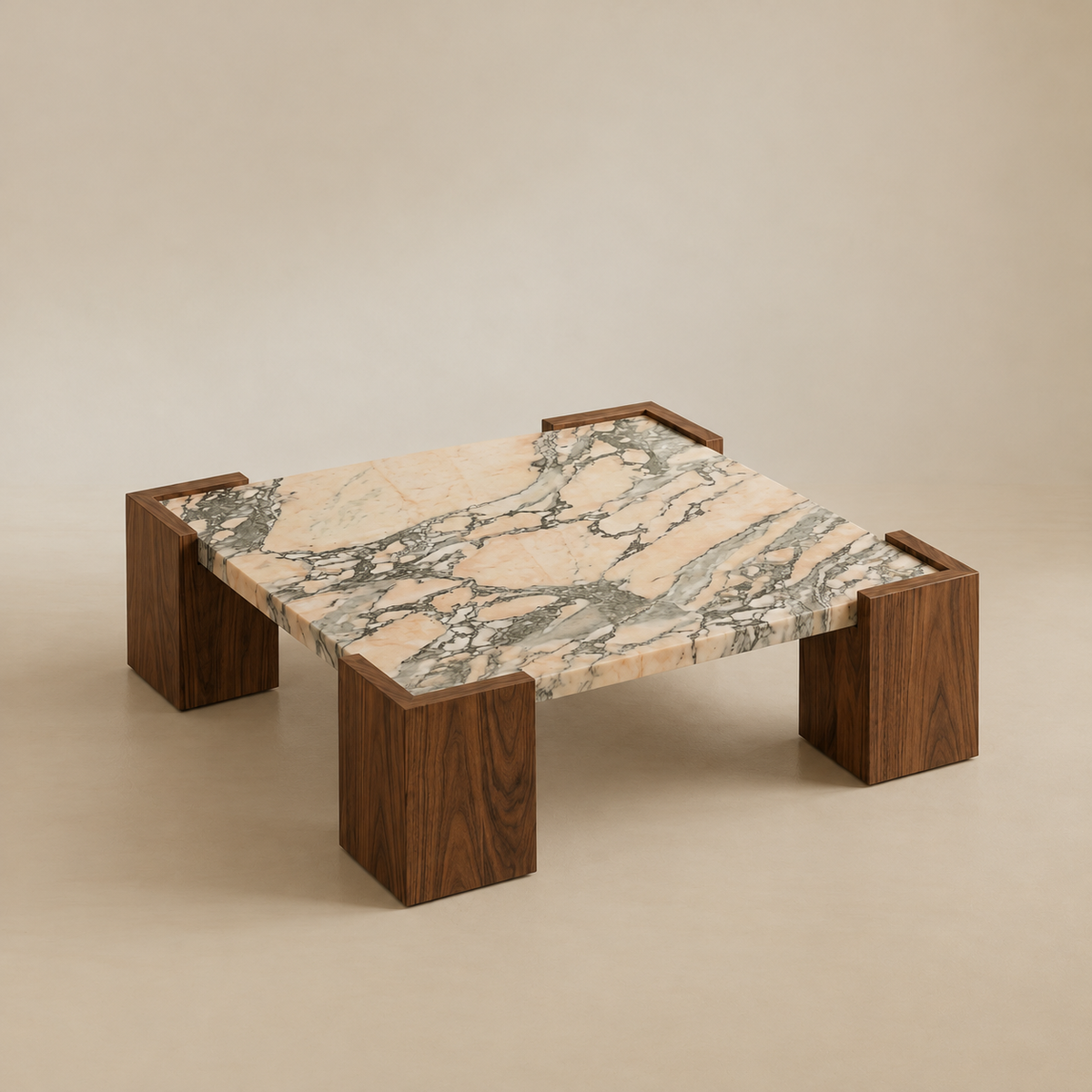 Elevated angled view showing the square marble top, natural veining and walnut corner legs.