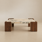 [Luca Marble & Walnut Coffee Table] Low front view showing the marble slab edge and walnut block legs.