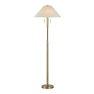 Lucienne Antique Brass Floor Lamp illuminated to show the warm glow through its off-white linen shade.