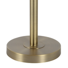 Close-up of the Lucienne floor lamp's round iron base in a dark antique brushed brass finish.