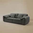 Gray sofa on a beige background