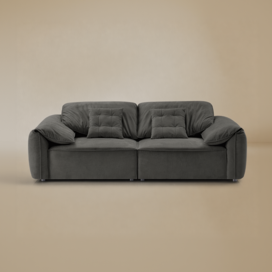 Gray sofa on a beige background
