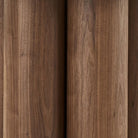 Close-up of a wooden surface of the Lyric Console Table