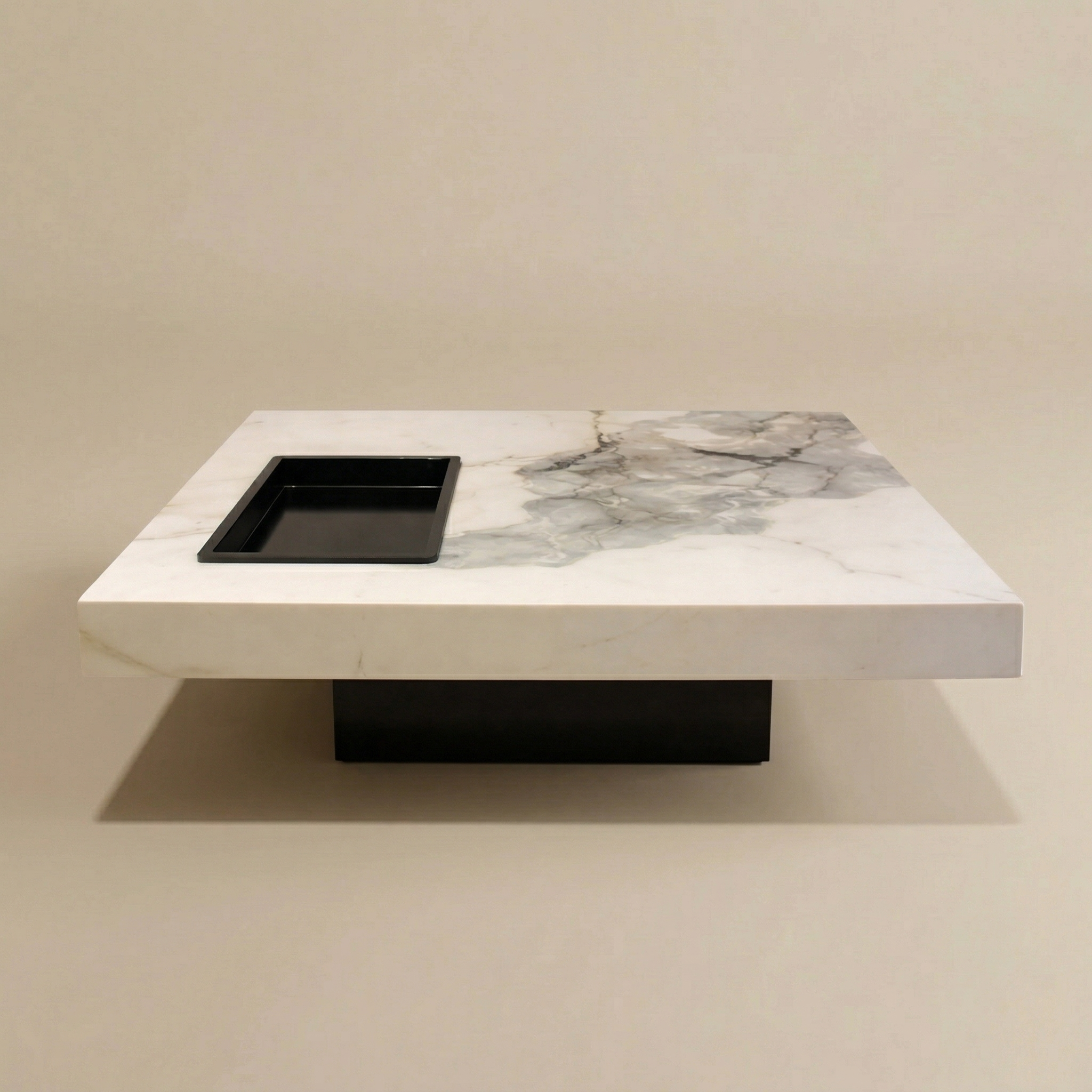 Marble pattern coffee table with a black square insert on a beige background