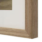 Macro close-up of the natural light wood frame and white matting on the Margot vessel wall art.