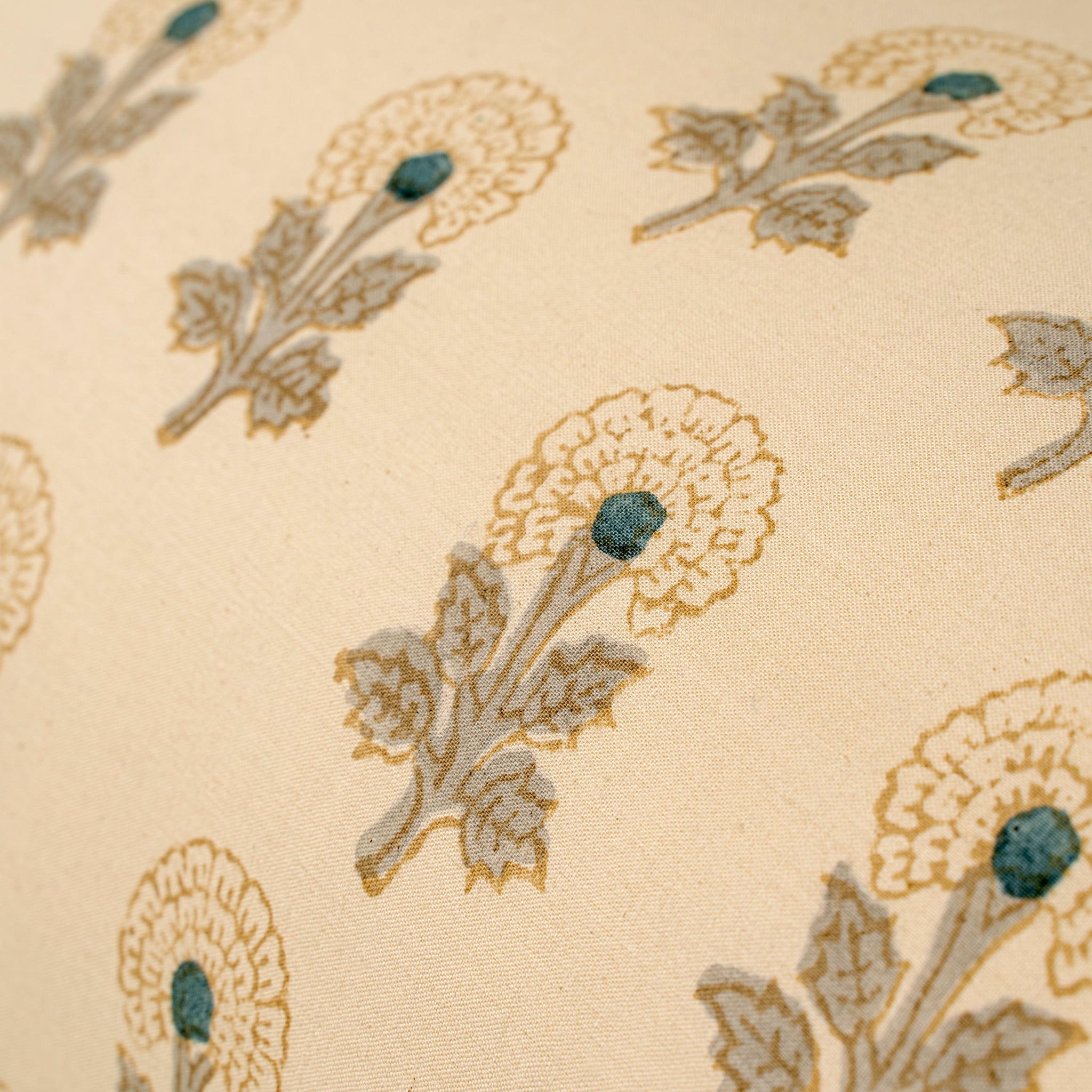 Close-up of floral patterned fabric with beige background
