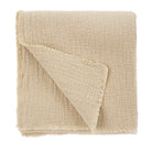 Beige textured blanket on a white background