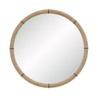 Front view of the Mirelle Round Wall Mirror with a circular silhouette, beige shagreen-textured vegan leather frame and antique metal accents.